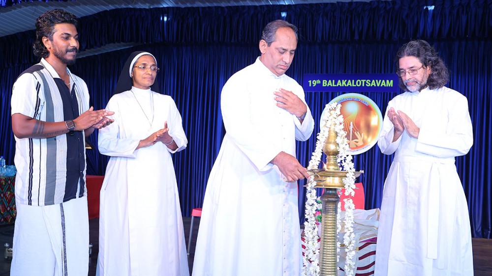 Chetana Balakalotsavam 19 - Inauguration Lighting by Fr. Joy Adambukulam, Manager, corporate Education Agency, Archdiocese of Thrissur