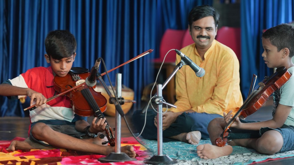 violin performance by a priest and a boy